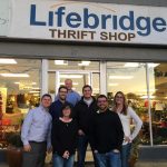 People standing in front of Lifebridge Thrift Shop in Salem, MA