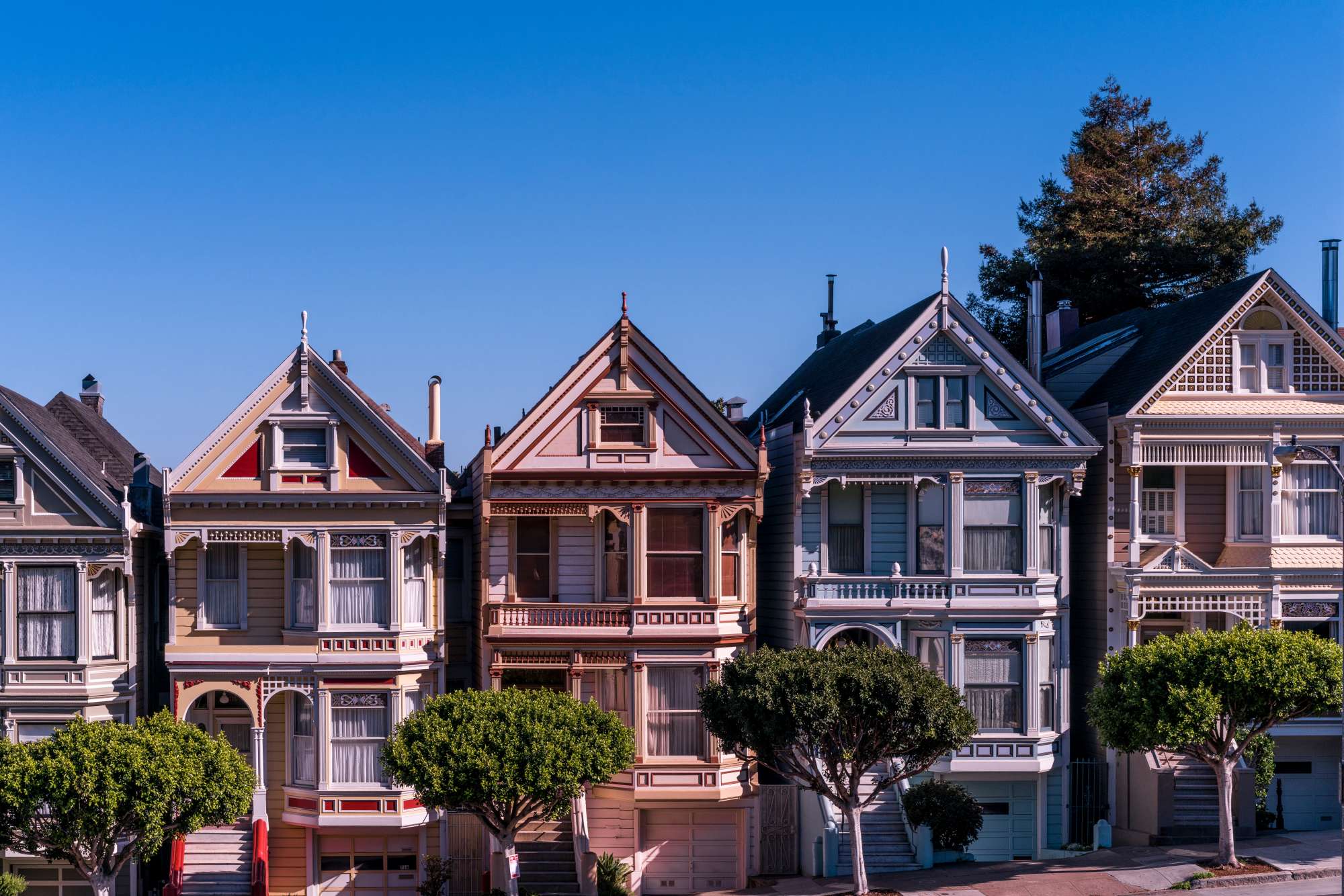 Photograph of a street of colorful houses.