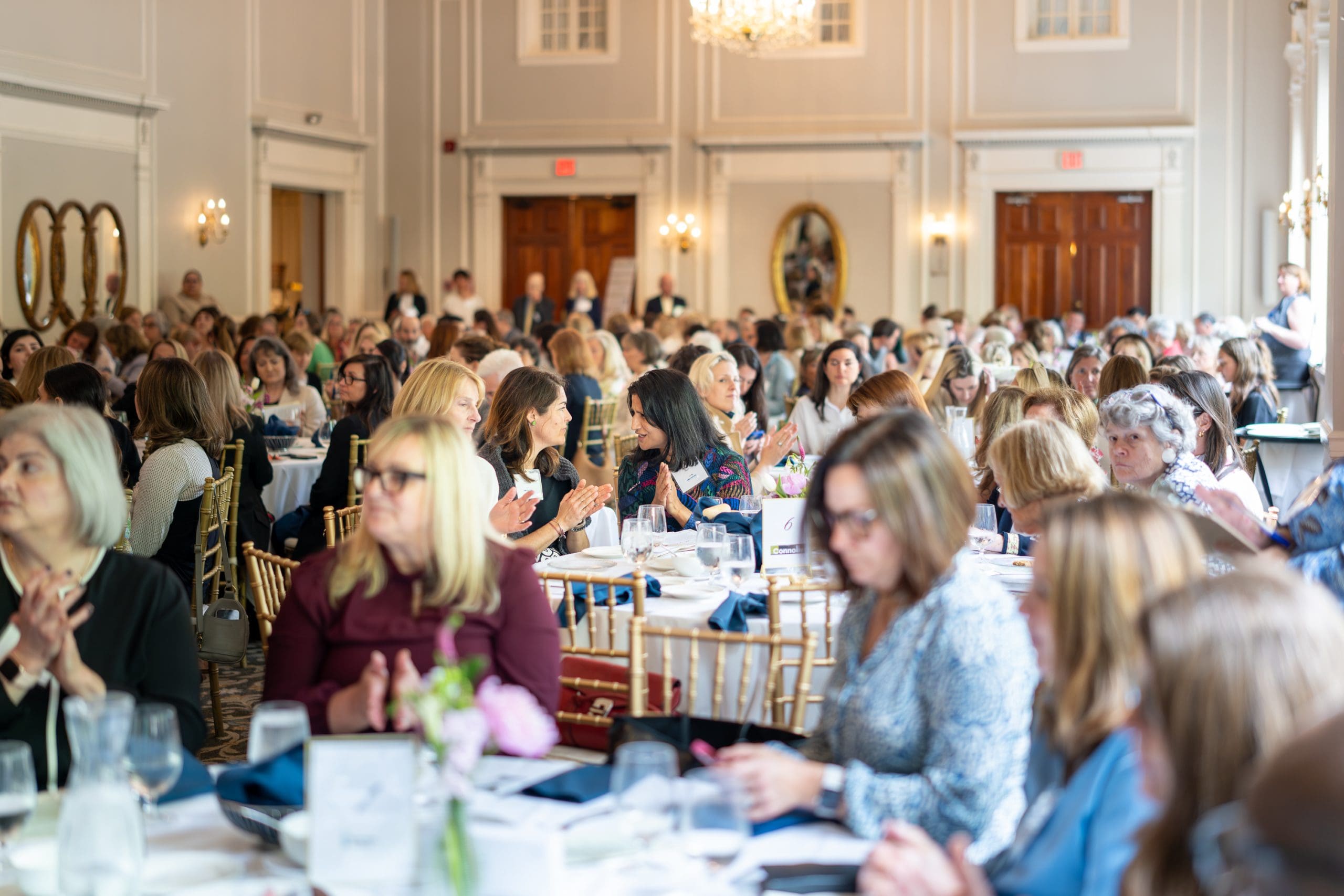 Guests enjoy lunch before a featured panel at "Together for Women"