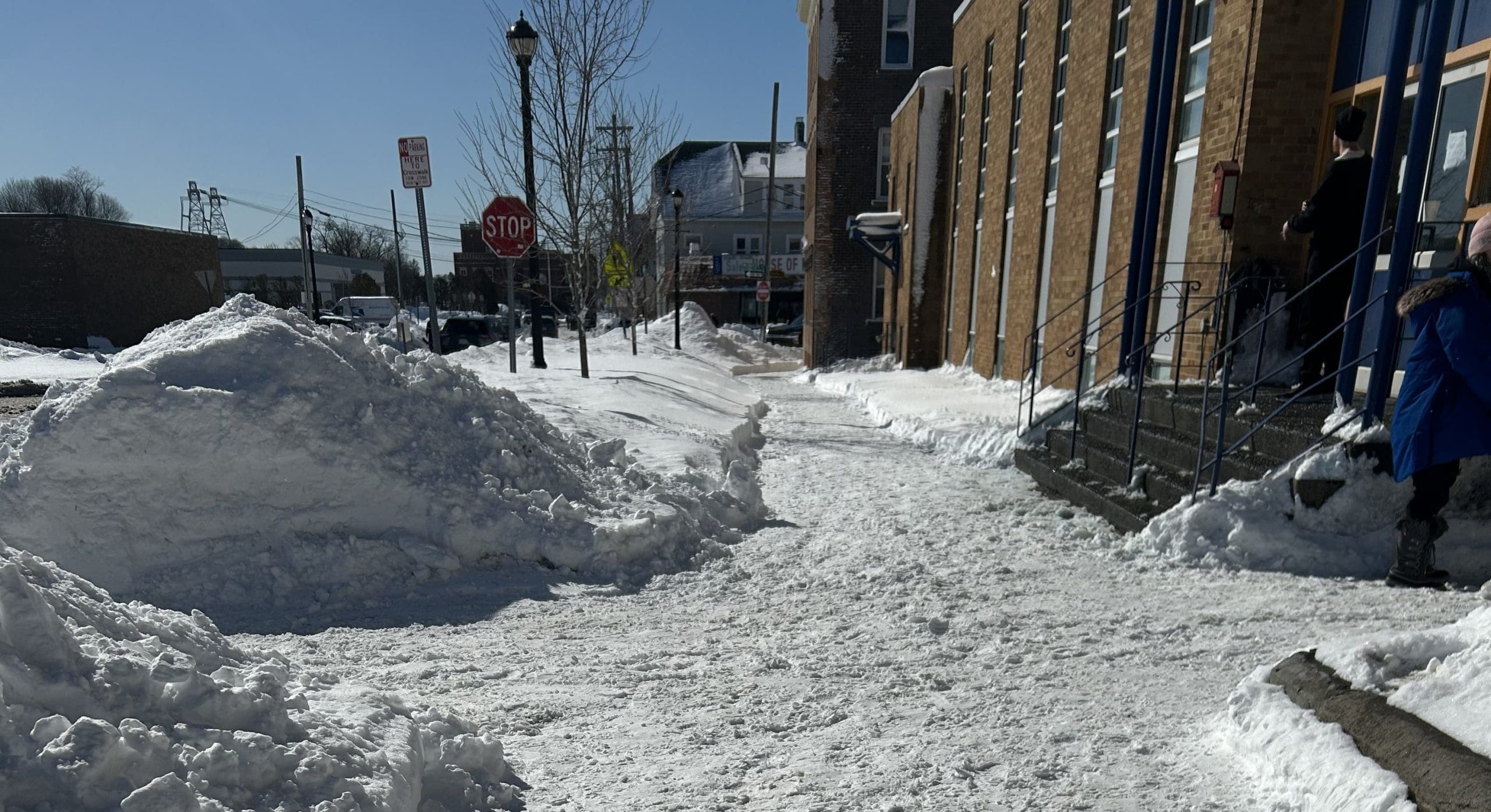 Front of building cleared of snow
