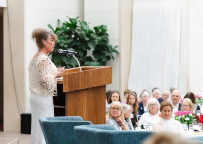 Women speaking at conference