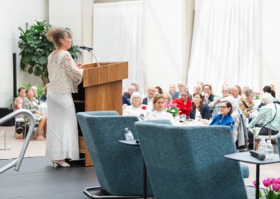 Female address the guests