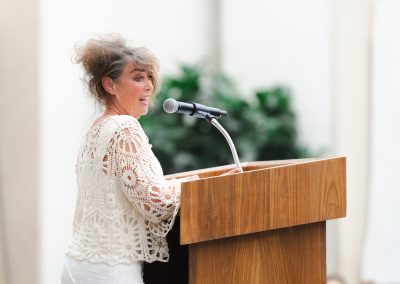Speaker at lectern